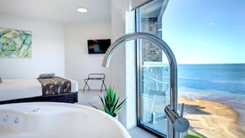 Luxury Studio, 1 King Bed, Jetted Tub, Sea View | Beach/ocean view