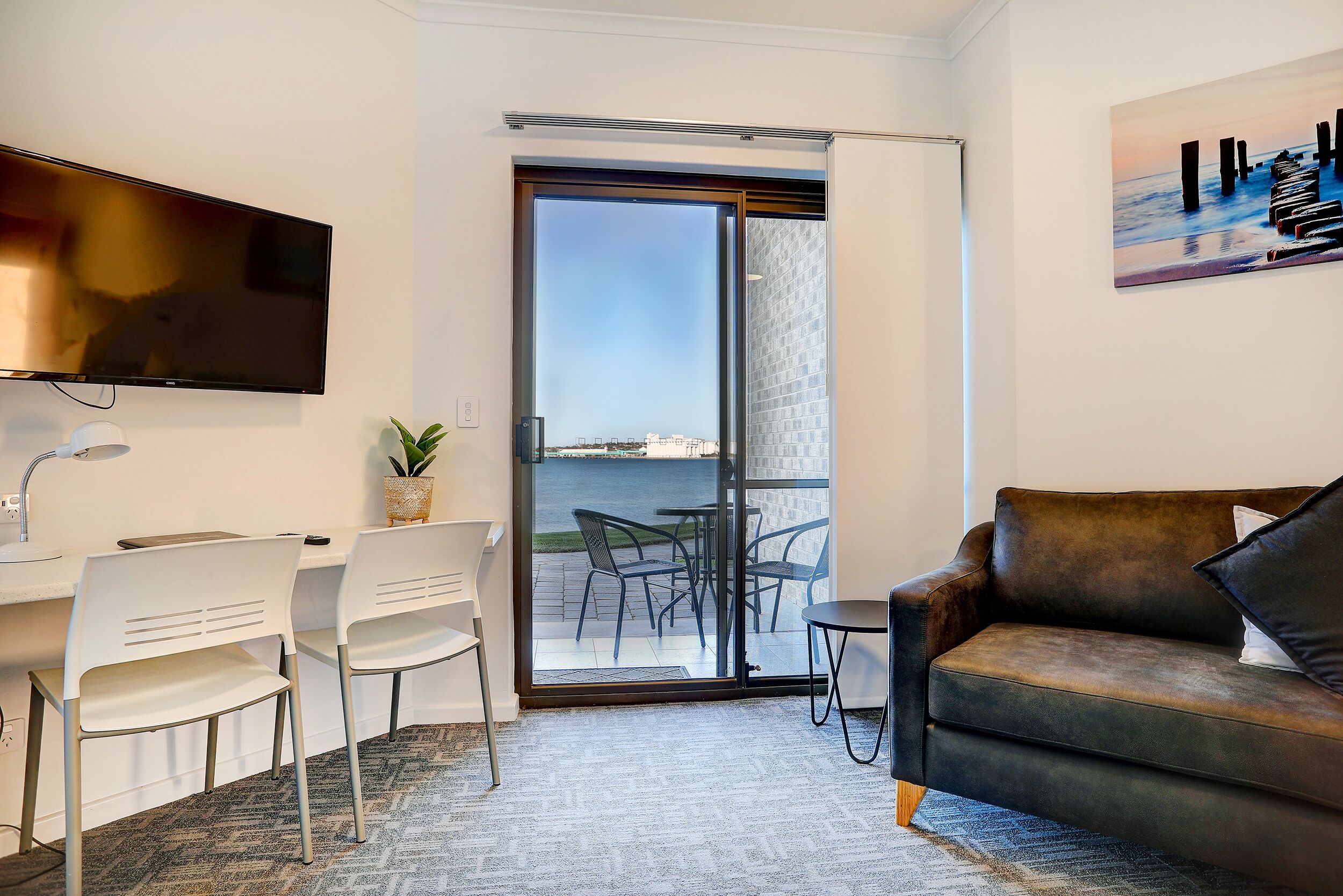 Panoramic Room, Sea View | Living room | Flat-screen TV