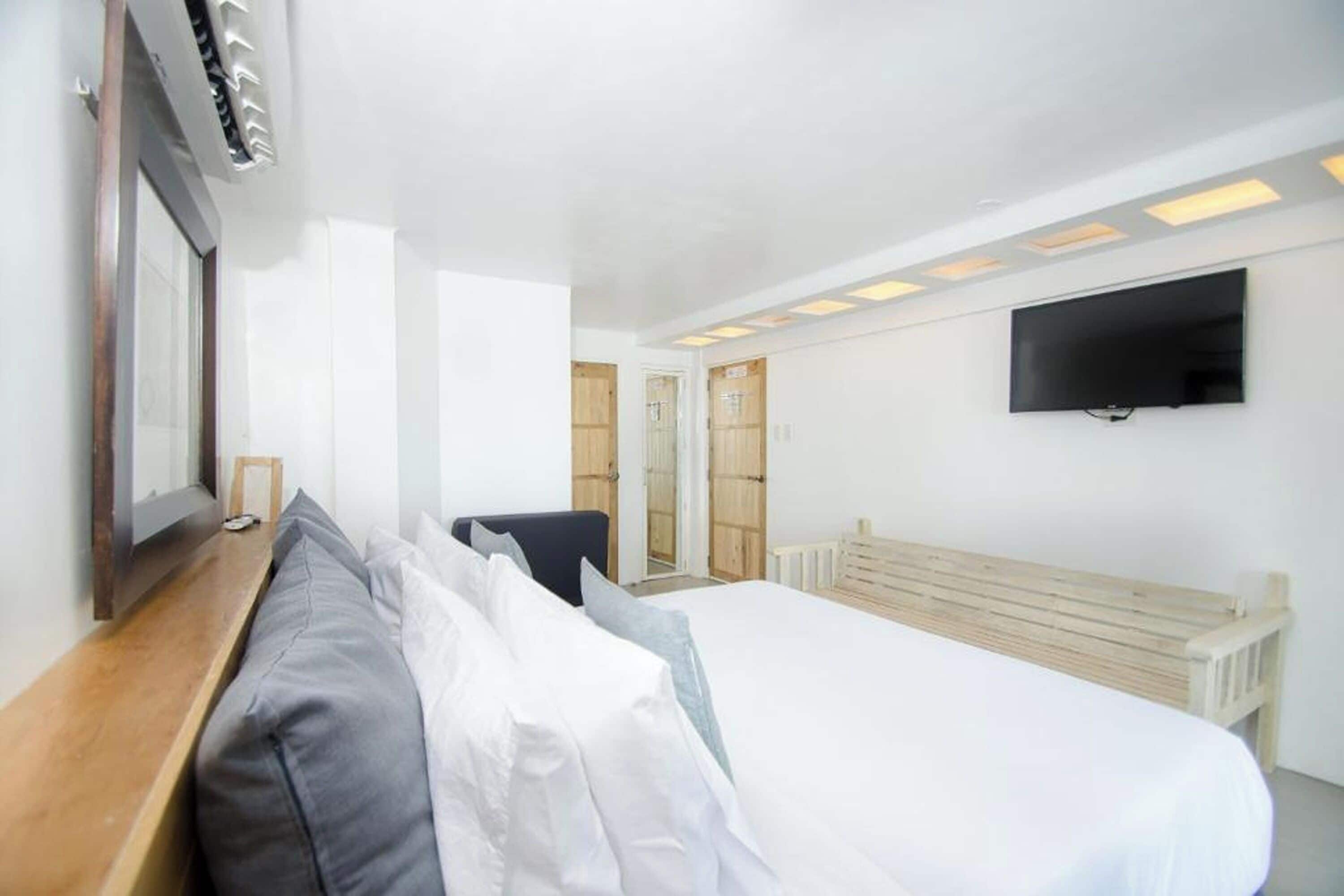 premiere room, 1 king bed, beach view, beachfront | 1 bedroom, in-room safe, desk, free wifi