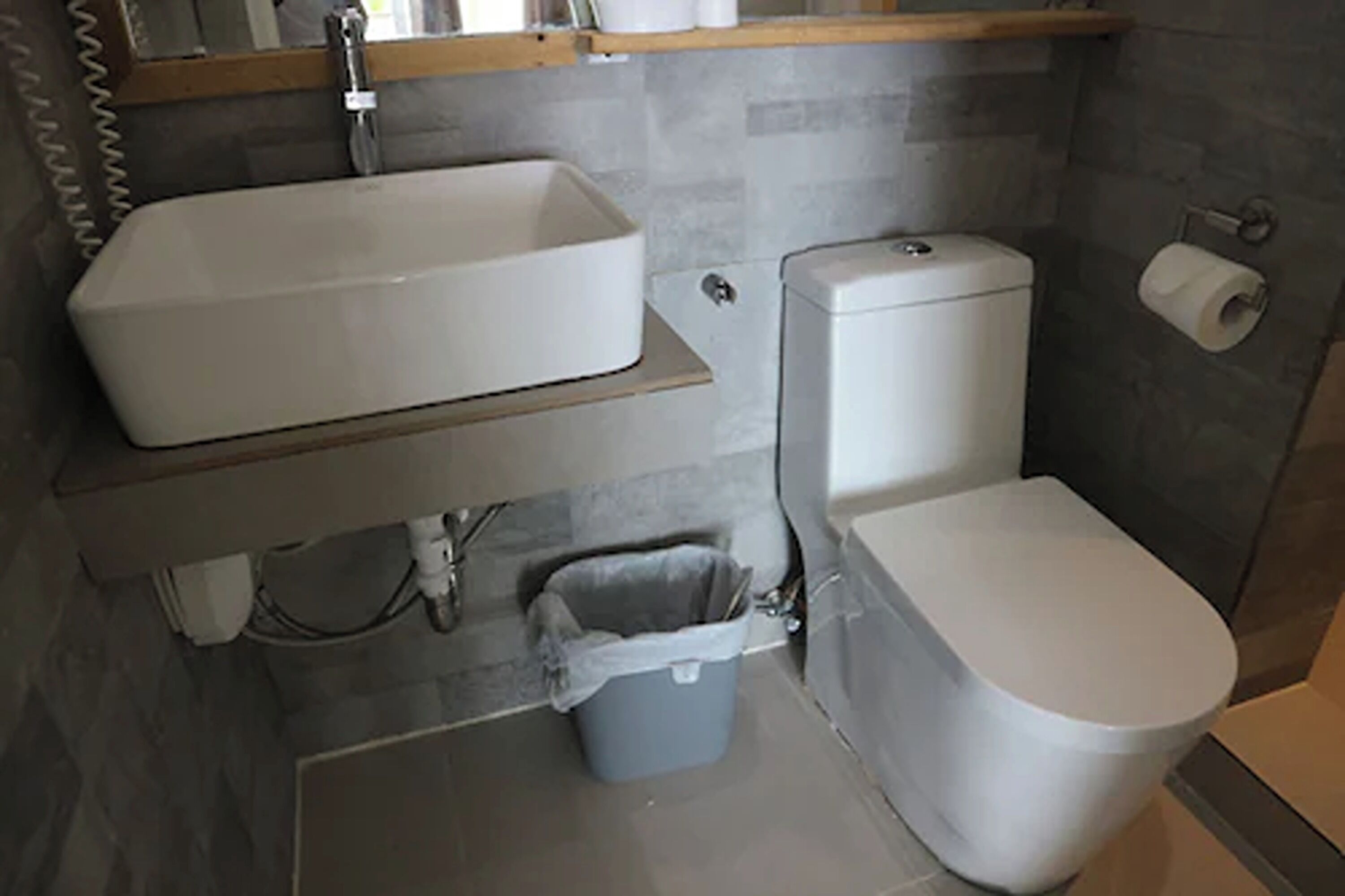 loft room with ocean view | bathroom | shower, free toiletries, hair dryer, bidet