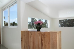 Deluxe Room, Sea View | 1 bedroom, in-room safe, desk, free WiFi