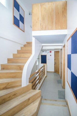 Deluxe Room, Sea View | 1 bedroom, in-room safe, desk, free WiFi