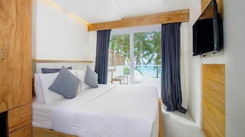 Beachfront, Balcony | 1 bedroom, in-room safe, desk, free WiFi