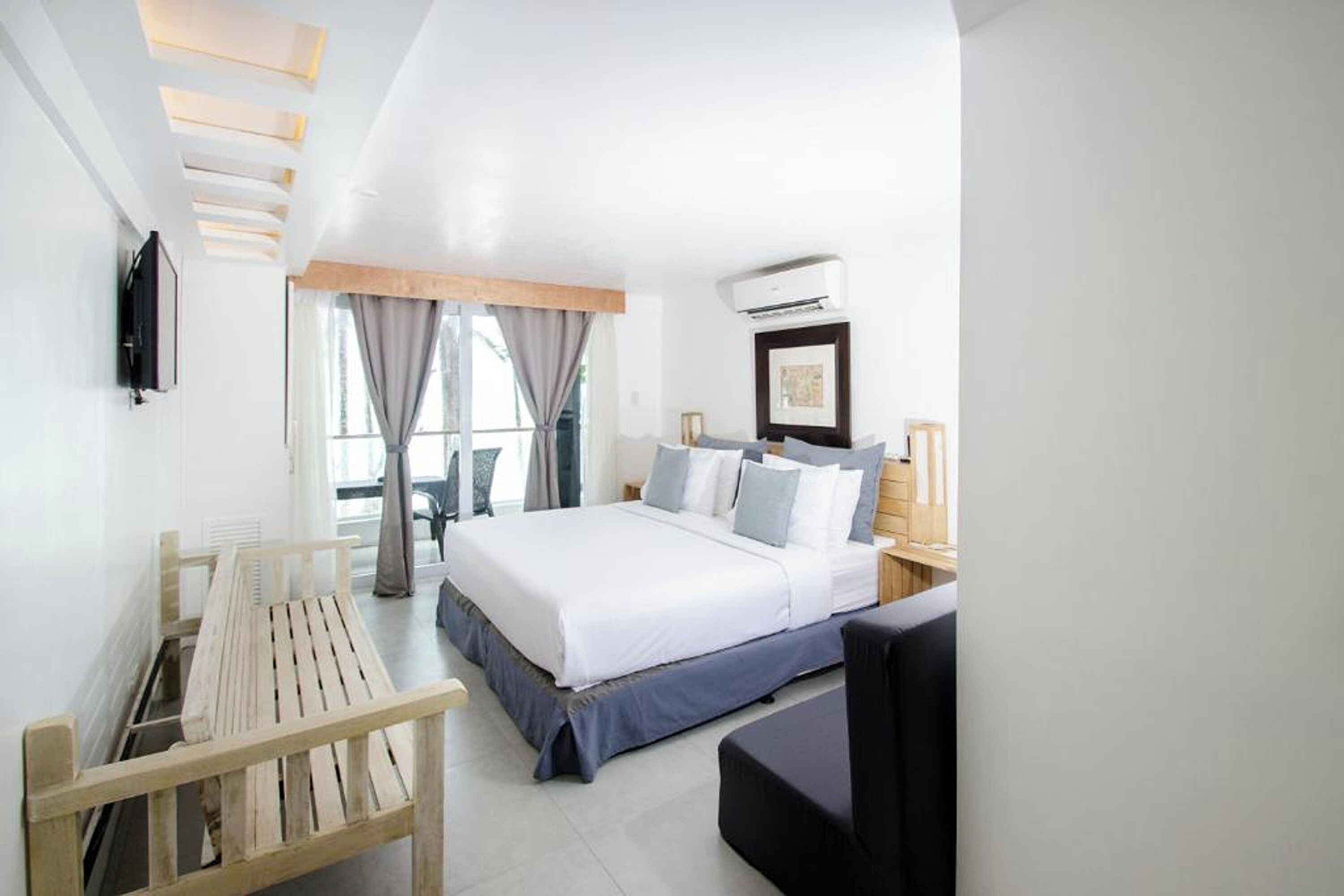 premiere room, 1 king bed, beach view, beachfront | 1 bedroom, in-room safe, desk, free wifi