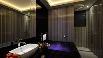 Separate tub and shower, hair dryer, slippers, towels