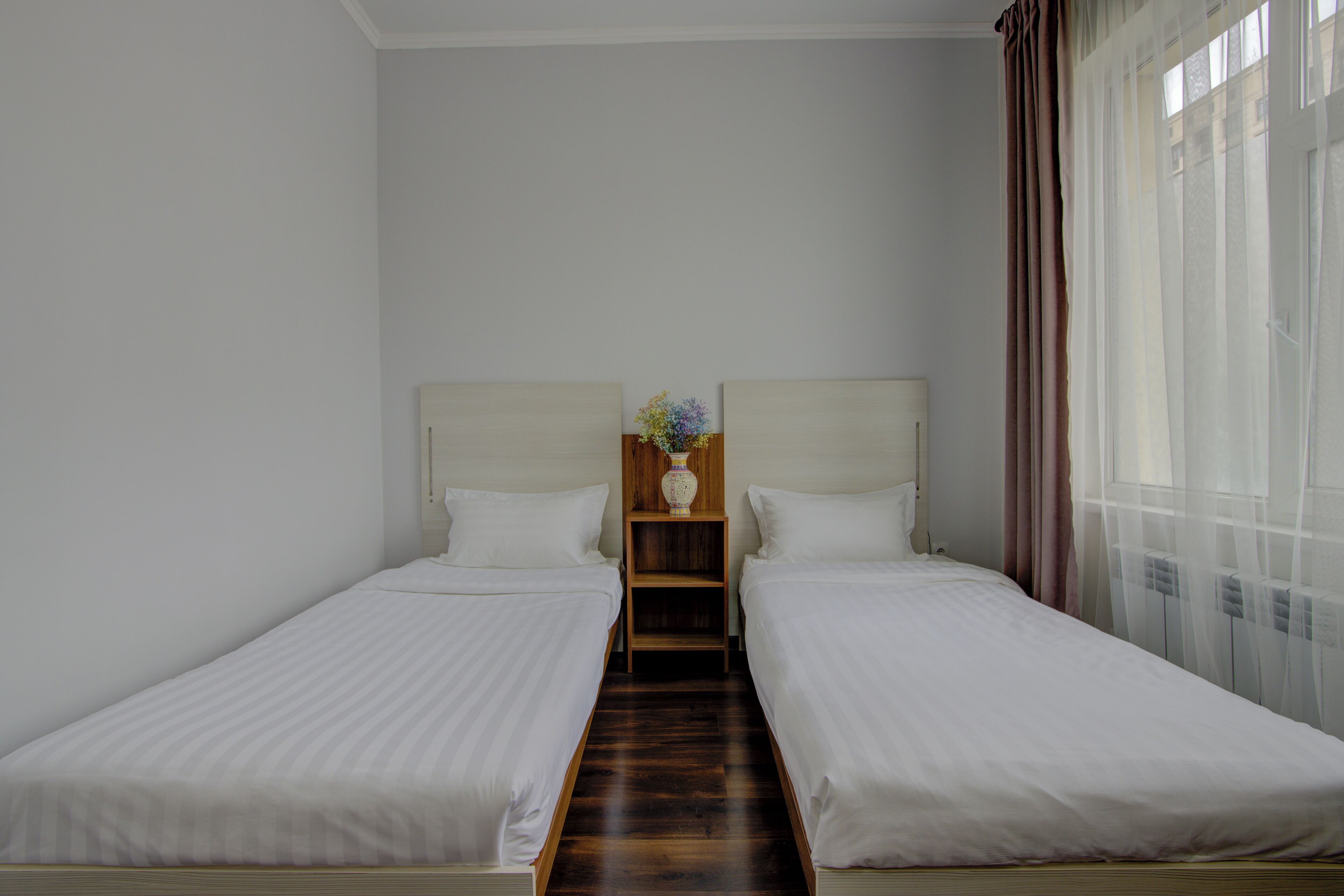 standard twin room | premium bedding, in-room safe, desk, iron/ironing board