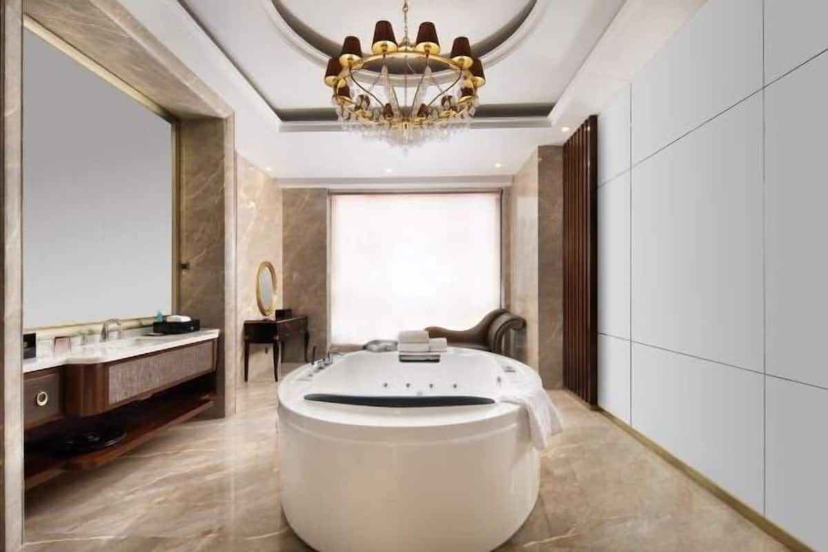 Bathroom | Separate bathtub and shower, free toiletries, hair dryer, bathrobes