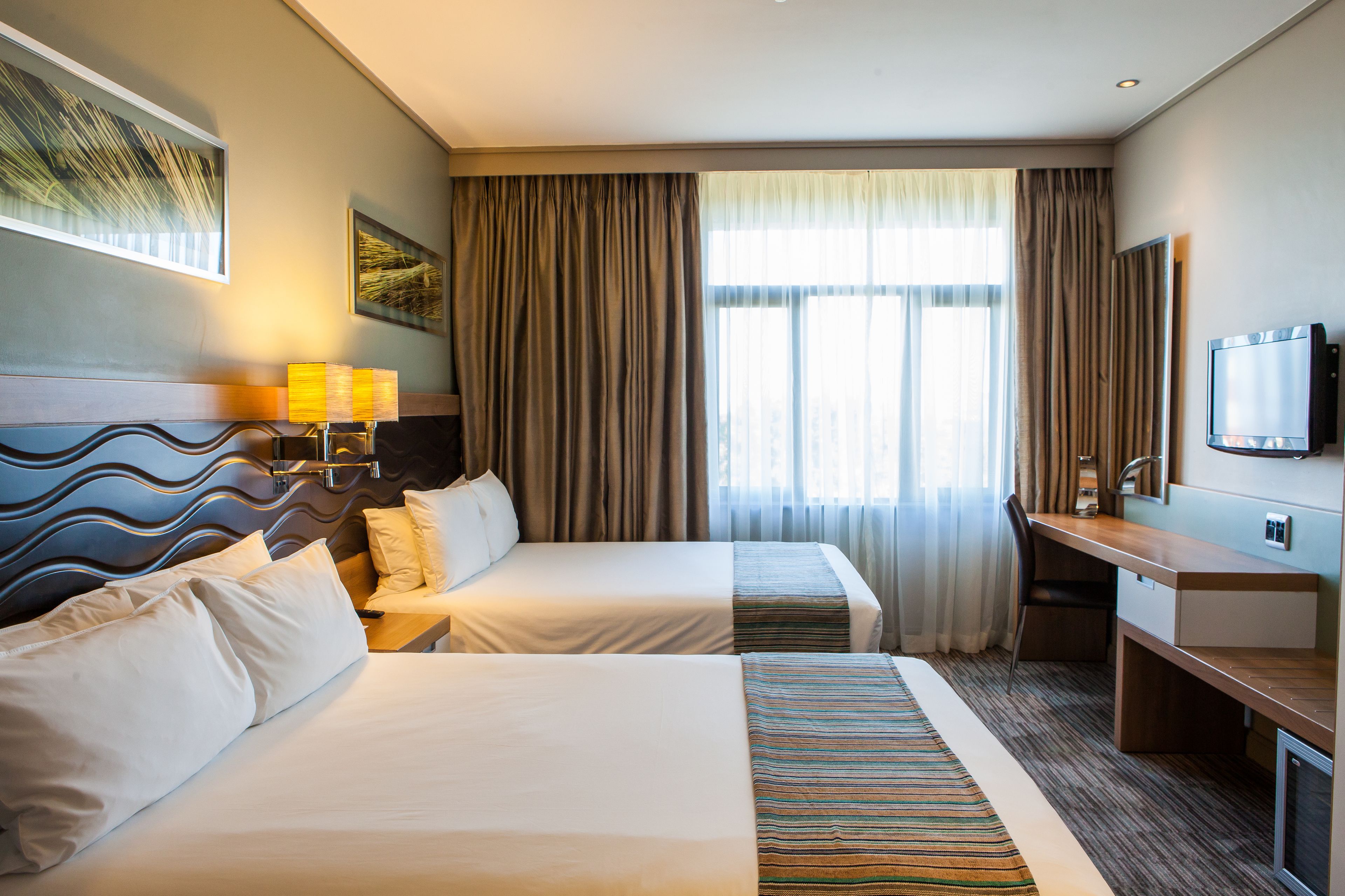 standard room, 2 double beds, non smoking | minibar, in-room safe, desk, blackout curtains