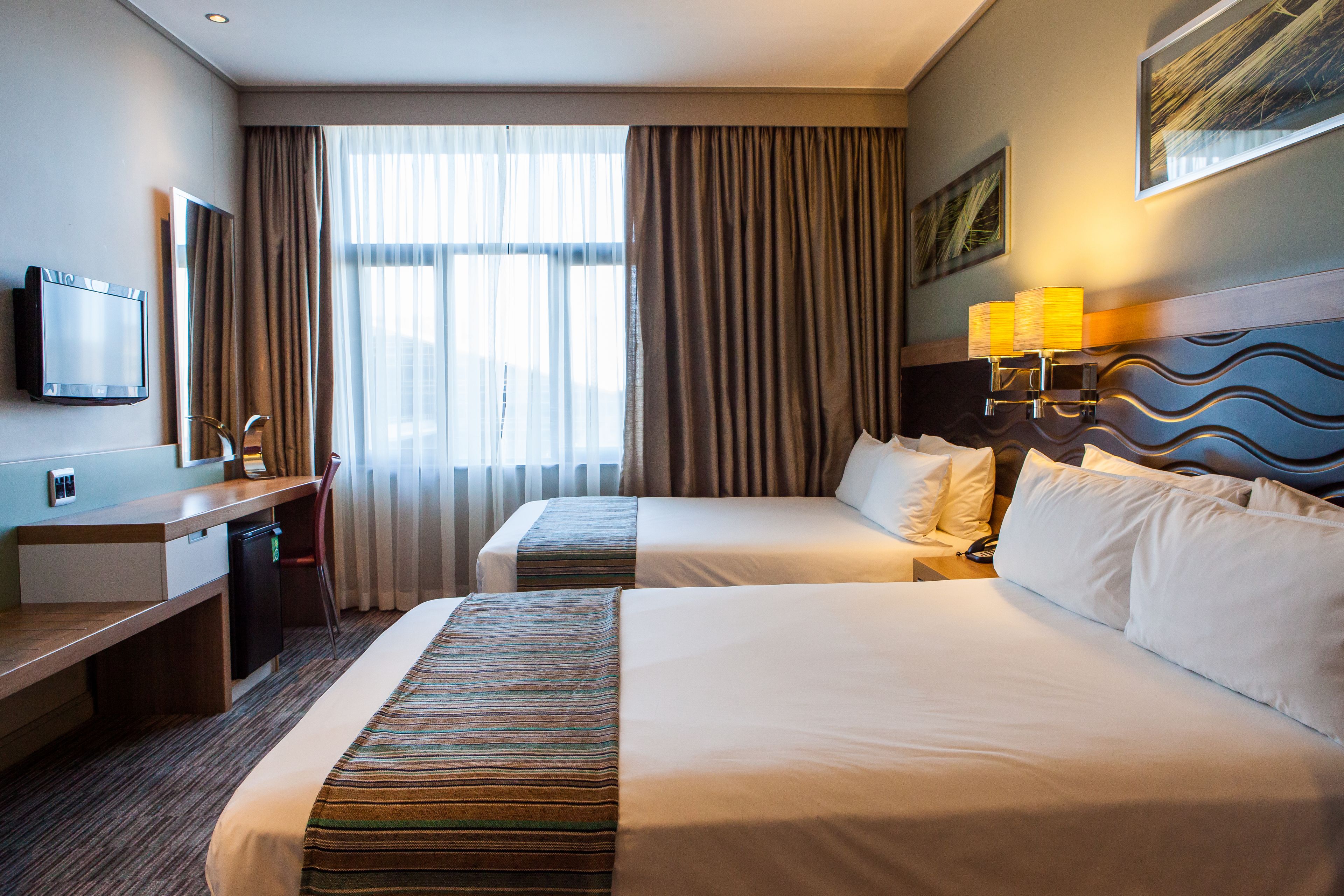 standard room, 2 double beds, non smoking | minibar, in-room safe, desk, blackout curtains