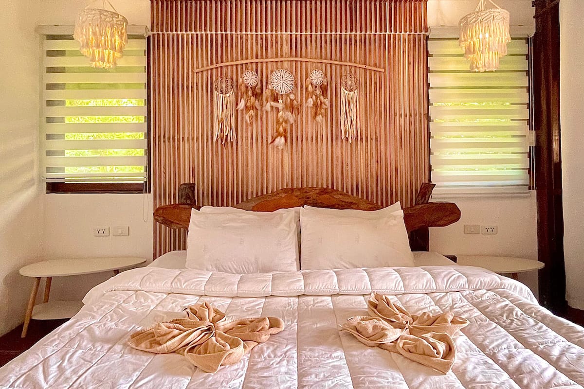 Executive Beach Front Cottage | Premium bedding, desk, laptop workspace, bed sheets