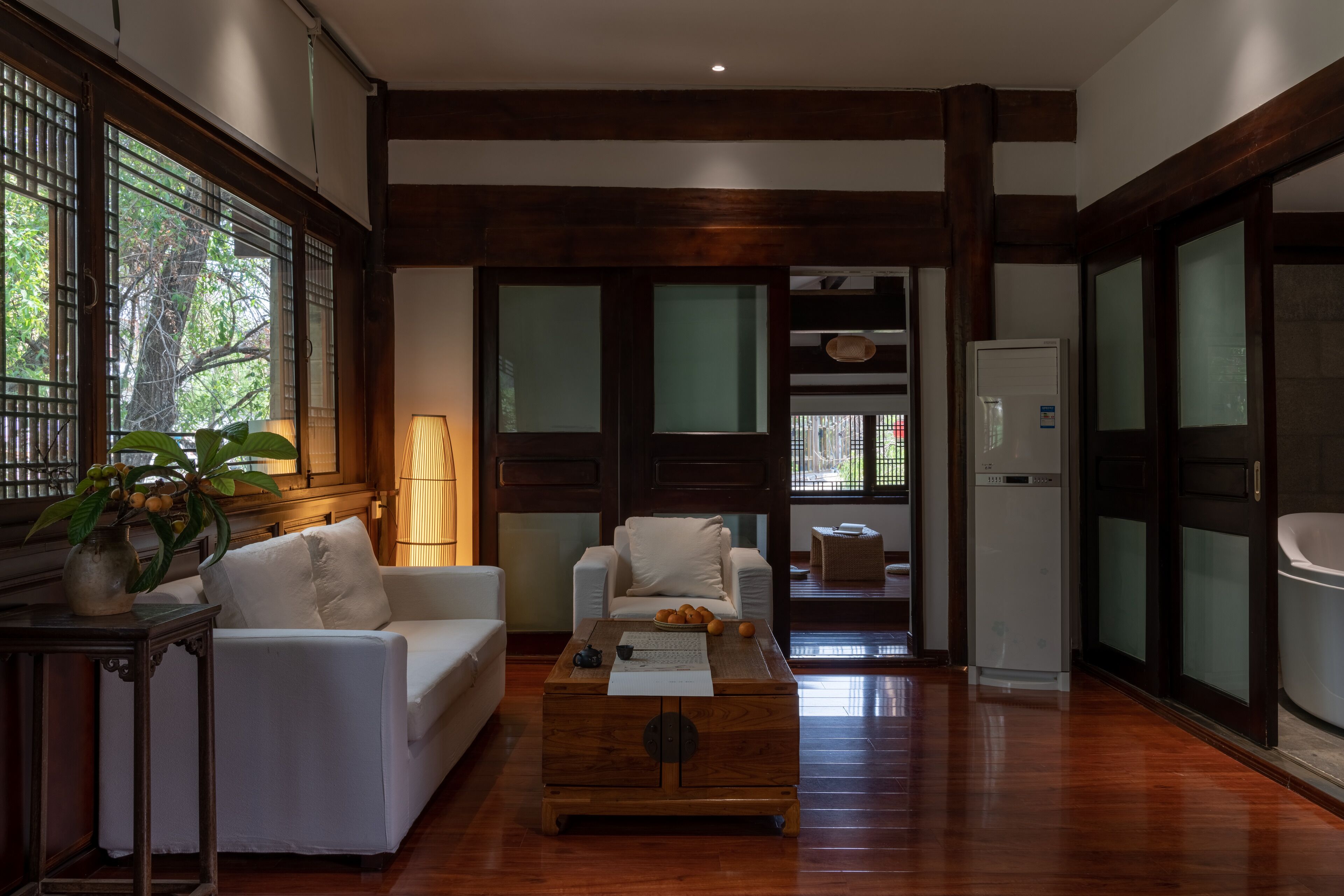 Riverview Suite Family Room | Down comforters, desk, blackout drapes, soundproofing