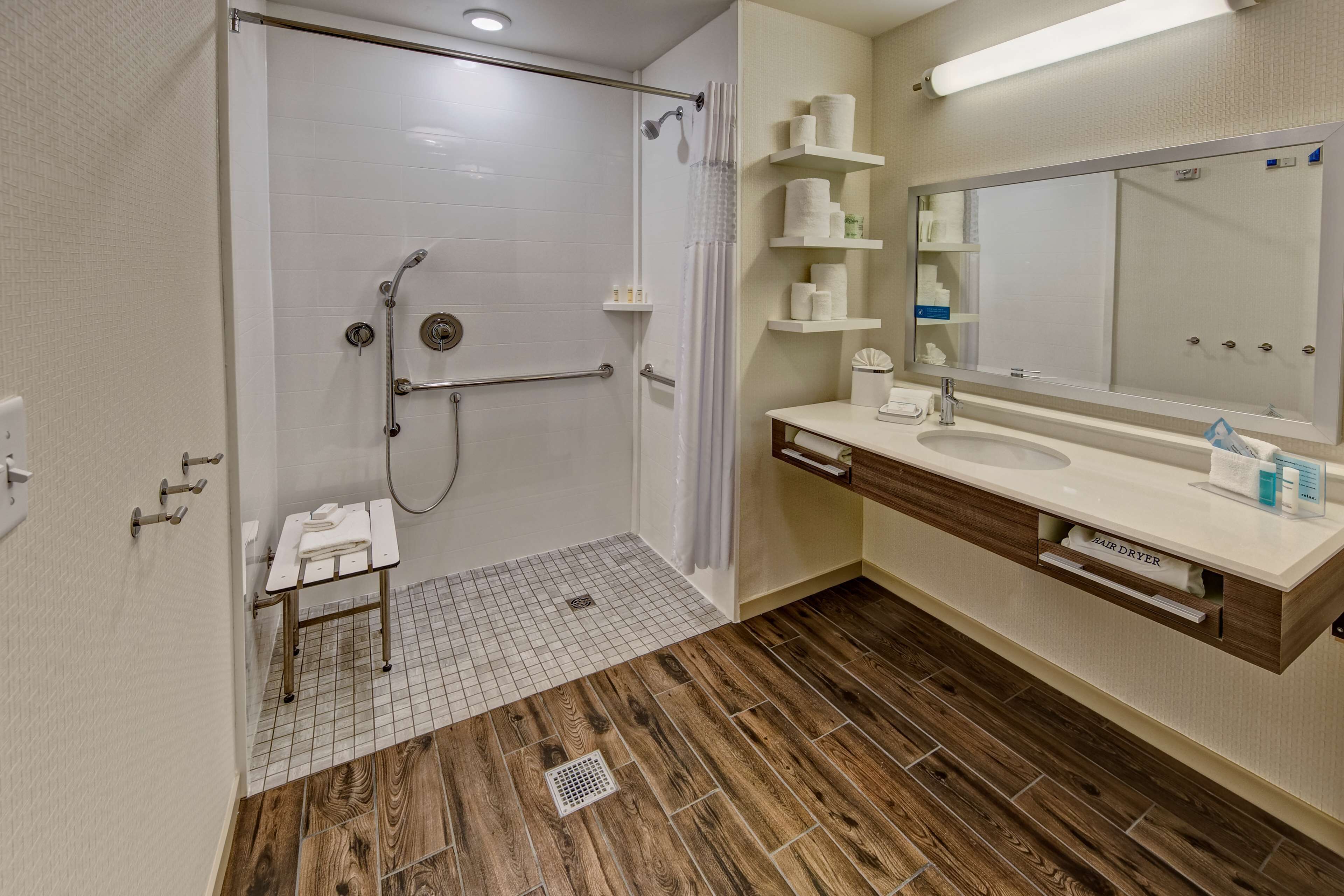 studio, 1 king bed, accessible, non smoking (roll in shower) | bathroom | combined shower/bathtub, hair dryer, bathrobes, towels