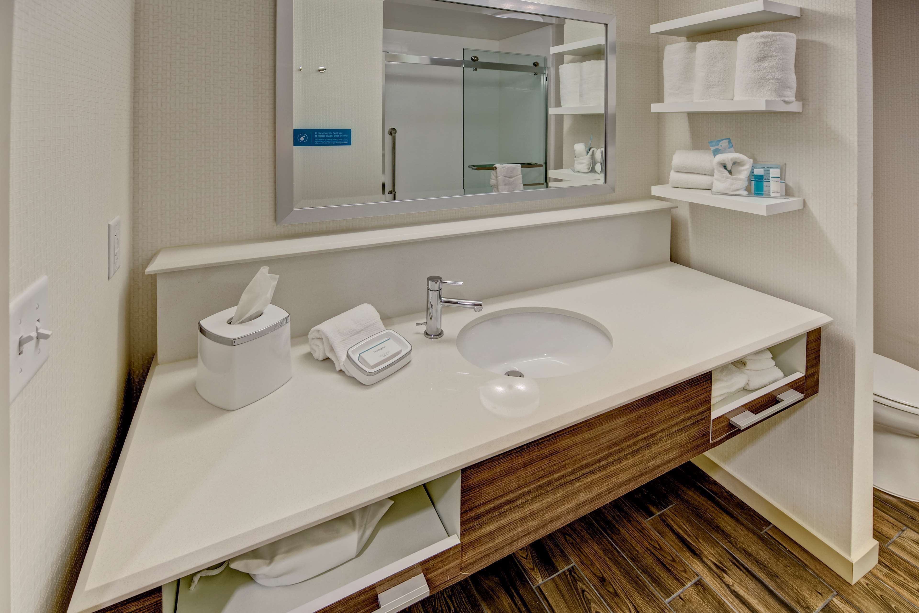 combined shower/bathtub, hair dryer, bathrobes, towels