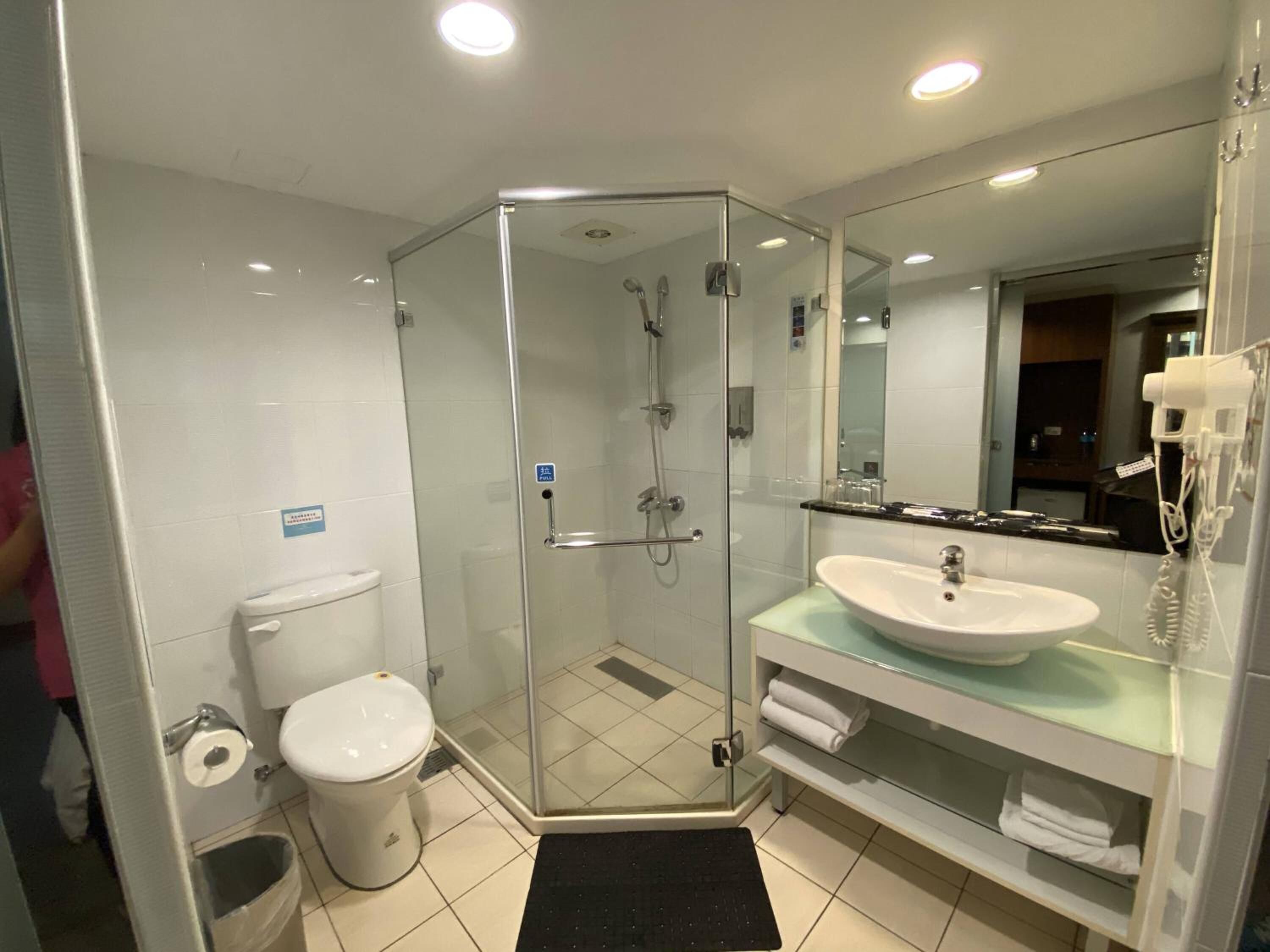 shower, free toiletries, hair dryer, slippers