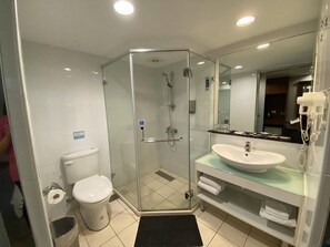 Shower, free toiletries, hair dryer, slippers