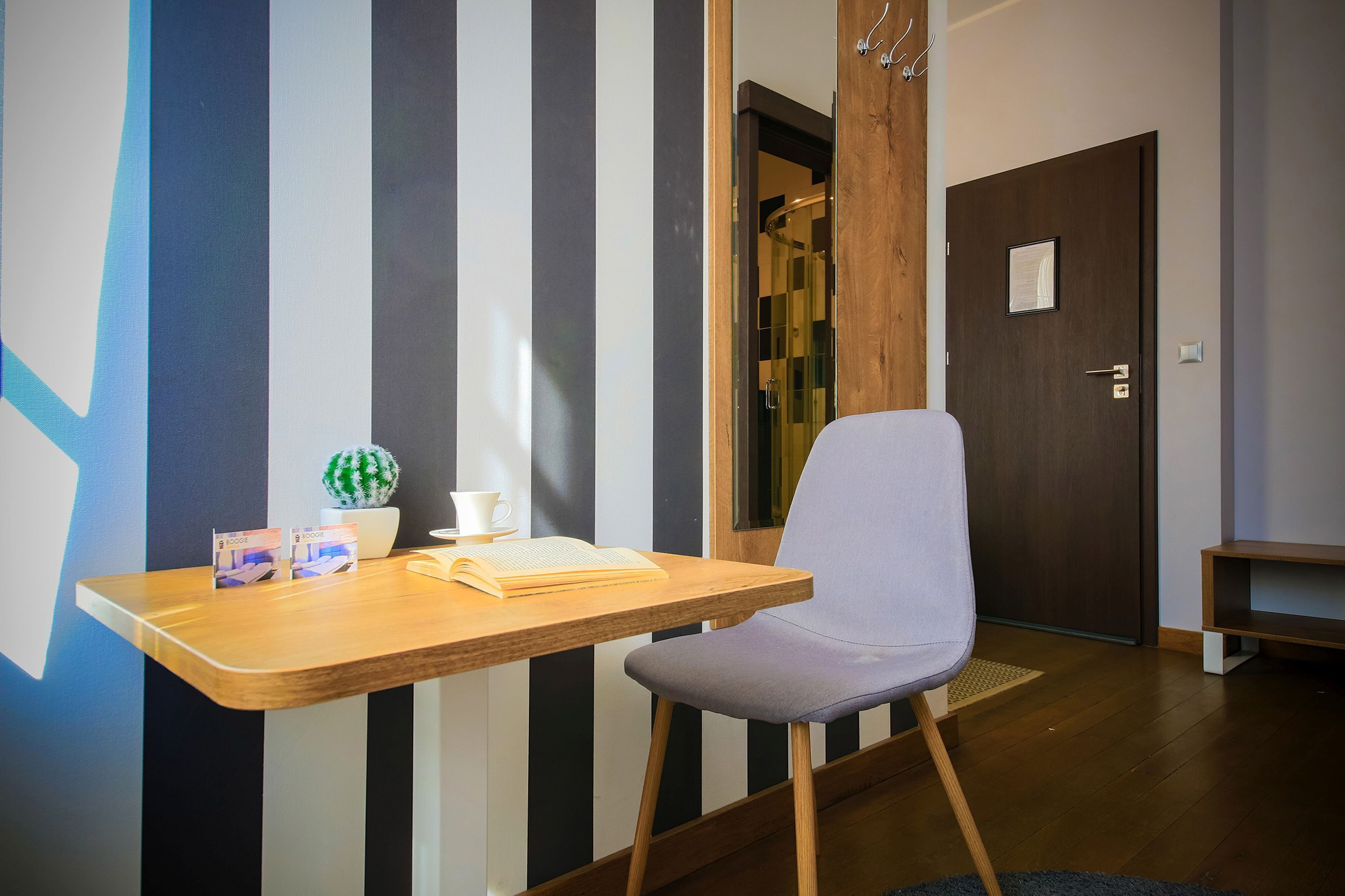 deluxe apartment | living area | flat-screen tv