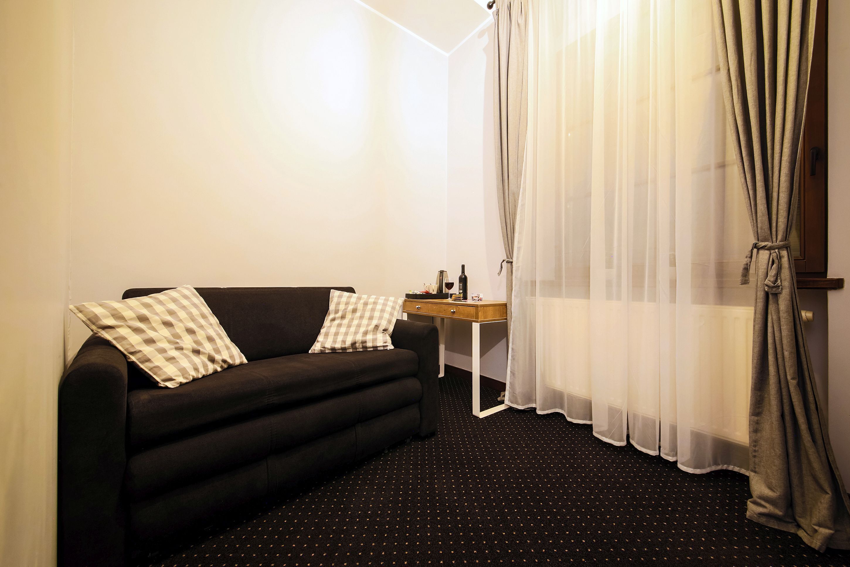 deluxe apartment | living area | flat-screen tv