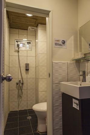 Shower, free toiletries, hair dryer, slippers