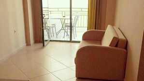 Apartment, 1 Bedroom | Living room | 32-inch LCD TV with cable channels, TV - Sayar Apart (Marmaris)