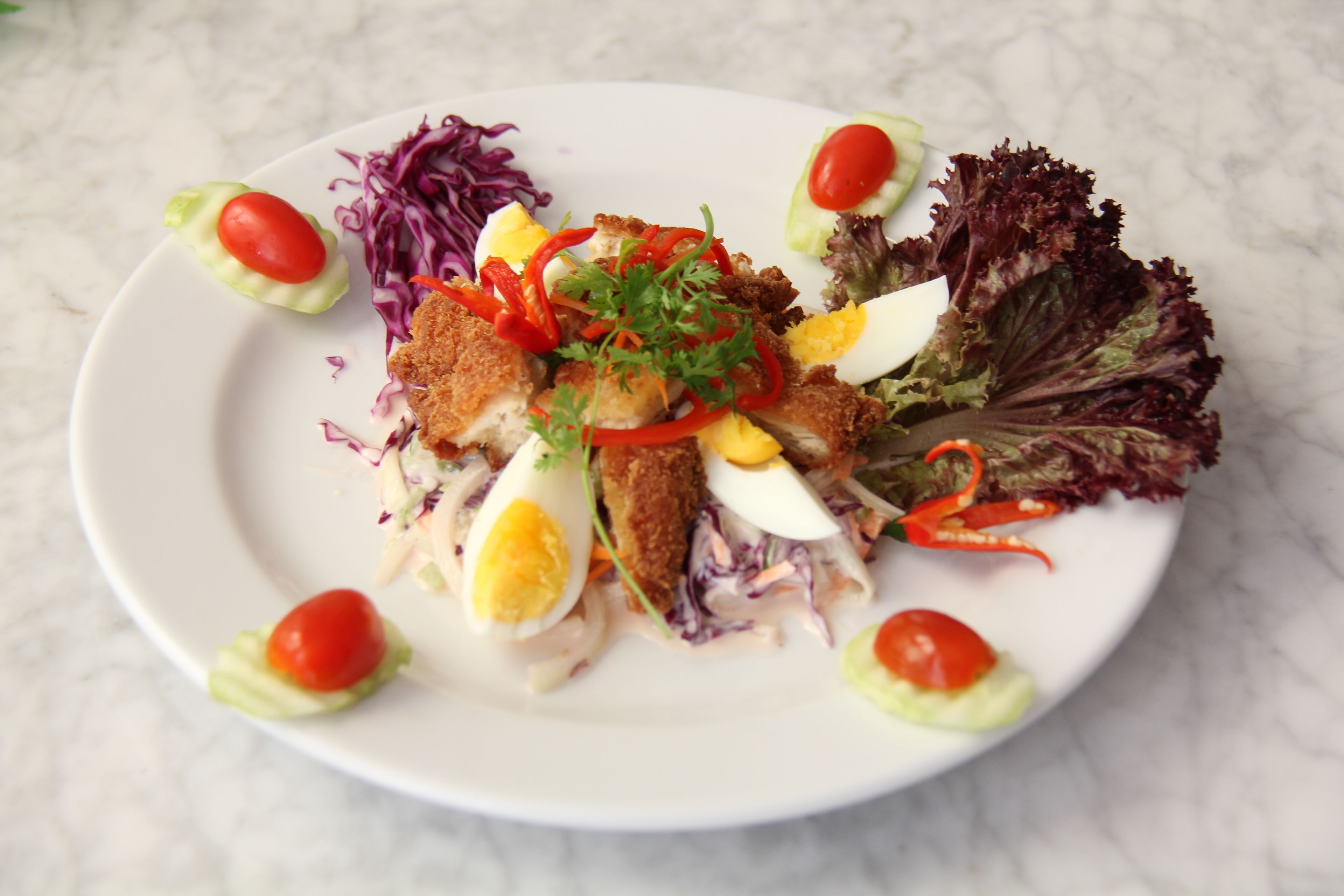 A plate of food with various ingredients.
