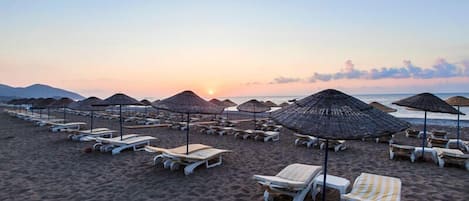 Private beach nearby, sun-loungers, beach umbrellas, beach bar