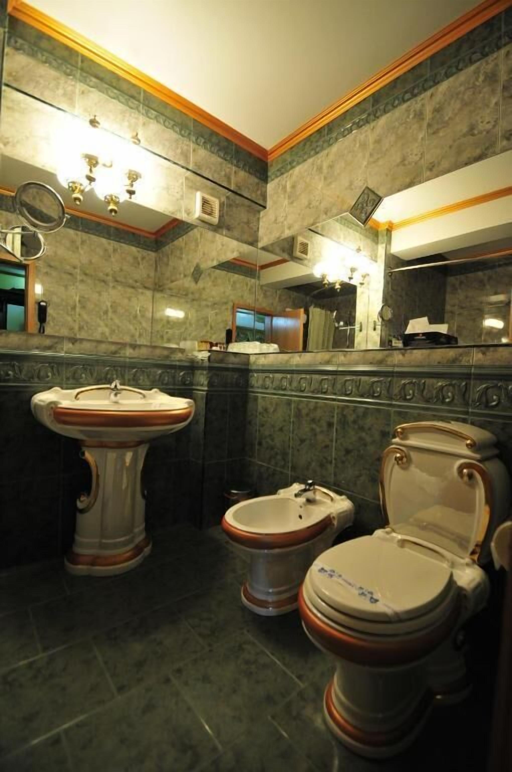 imperial suite | bathroom | combined shower/bathtub, jetted bath, hair dryer, slippers