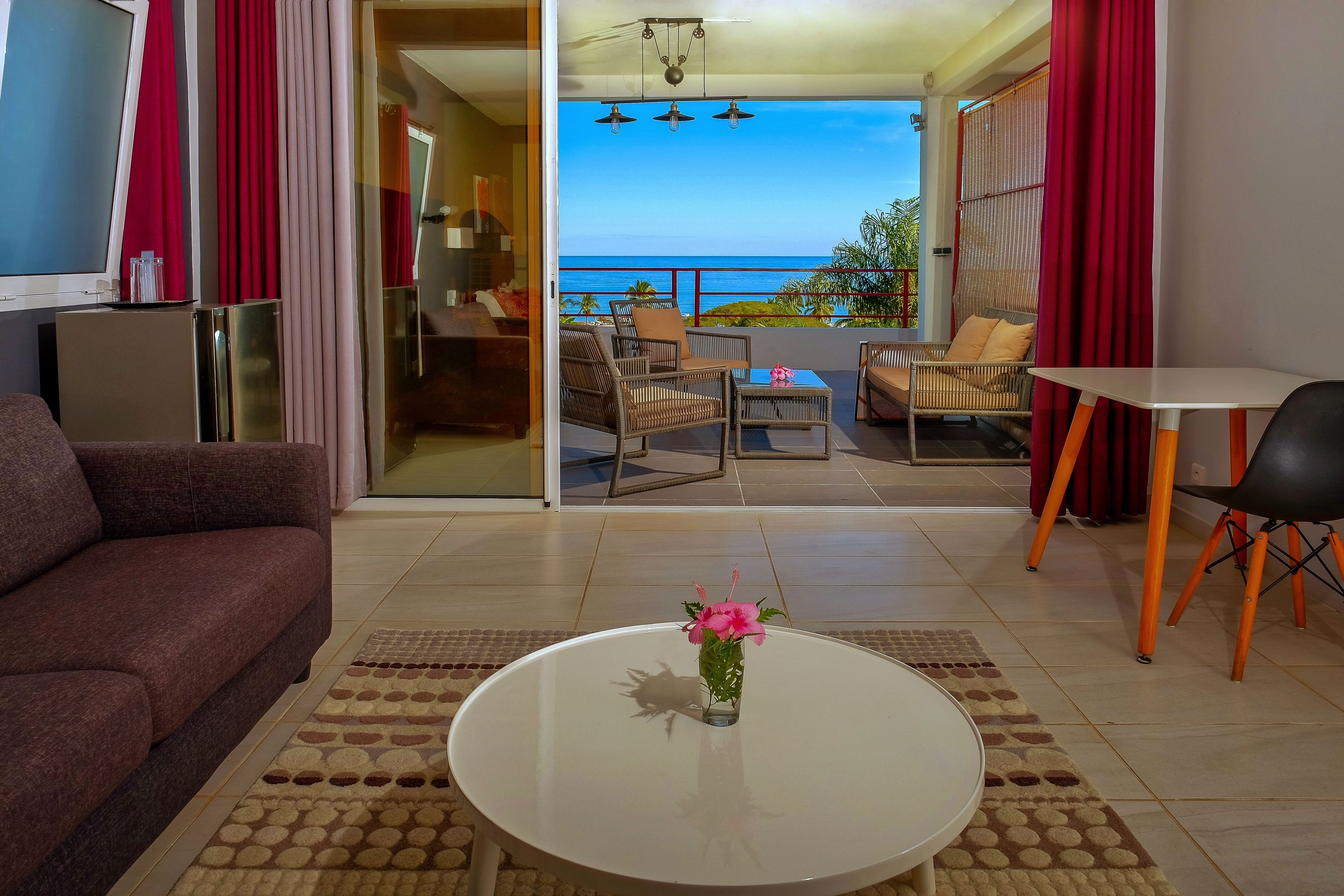 Big Panoramic Suite with Sea and Garden view | Living area | 32-inch flat-screen TV with satellite channels, TV