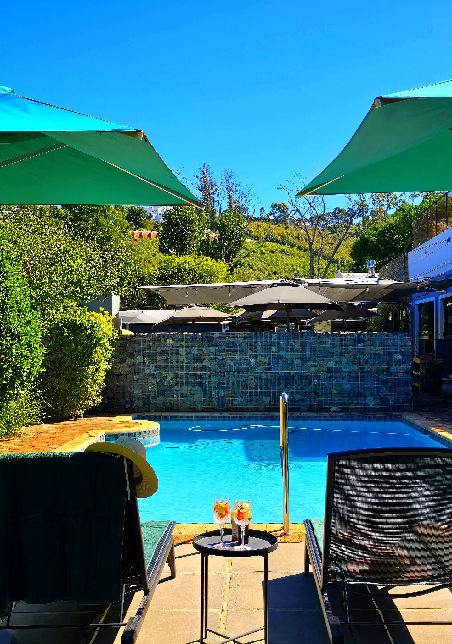 Outdoor pool, pool umbrellas, pool loungers