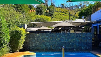 Outdoor pool, pool umbrellas, pool loungers