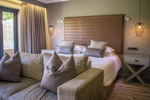 Luxury Suite, 1 King Bed, Garden View | 1 bedroom, premium bedding, minibar, in-room safe