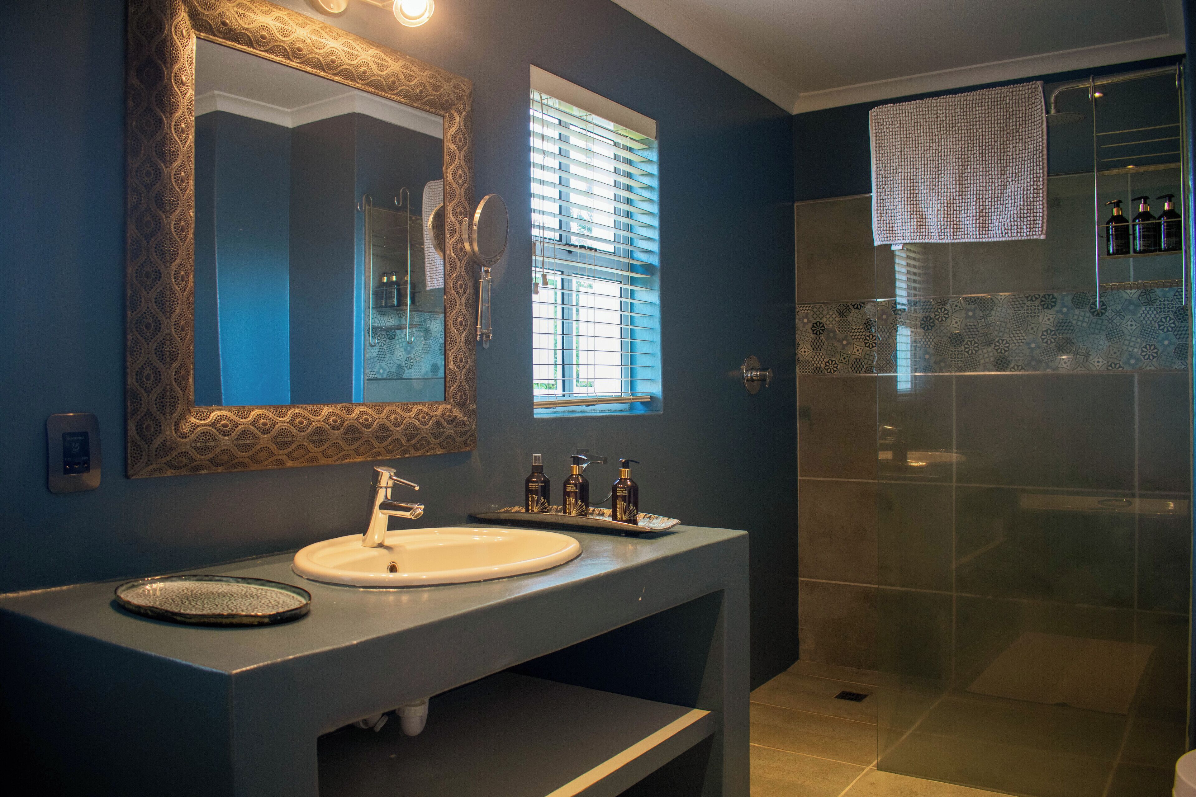 separate bathtub and shower, rainfall showerhead, hair dryer, bathrobes