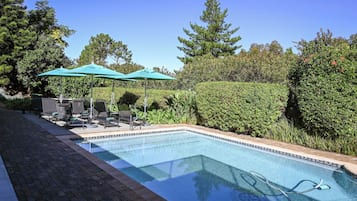 Outdoor pool, pool umbrellas, pool loungers
