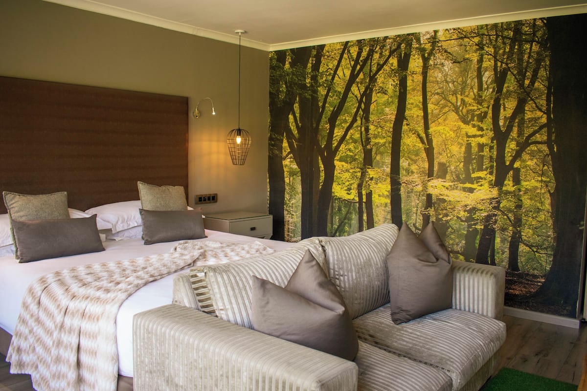 Suite de lujo, 1 cama King size, vista al jardín | Ropa de cama de alta calidad y minibar