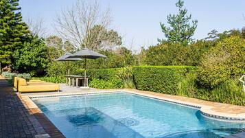 2 outdoor pools, pool umbrellas, pool loungers