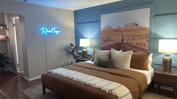 Habitación individual Deluxe | Espacio para trabajar con laptop, wifi gratis y ropa de cama