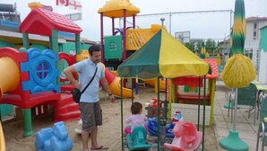 A playground with various play structures including slides and a climbing area. - Jole (Cesenatico)