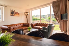 Raccoon Lodge | Living area - Vakantiepark Slagharen (Slagharen)