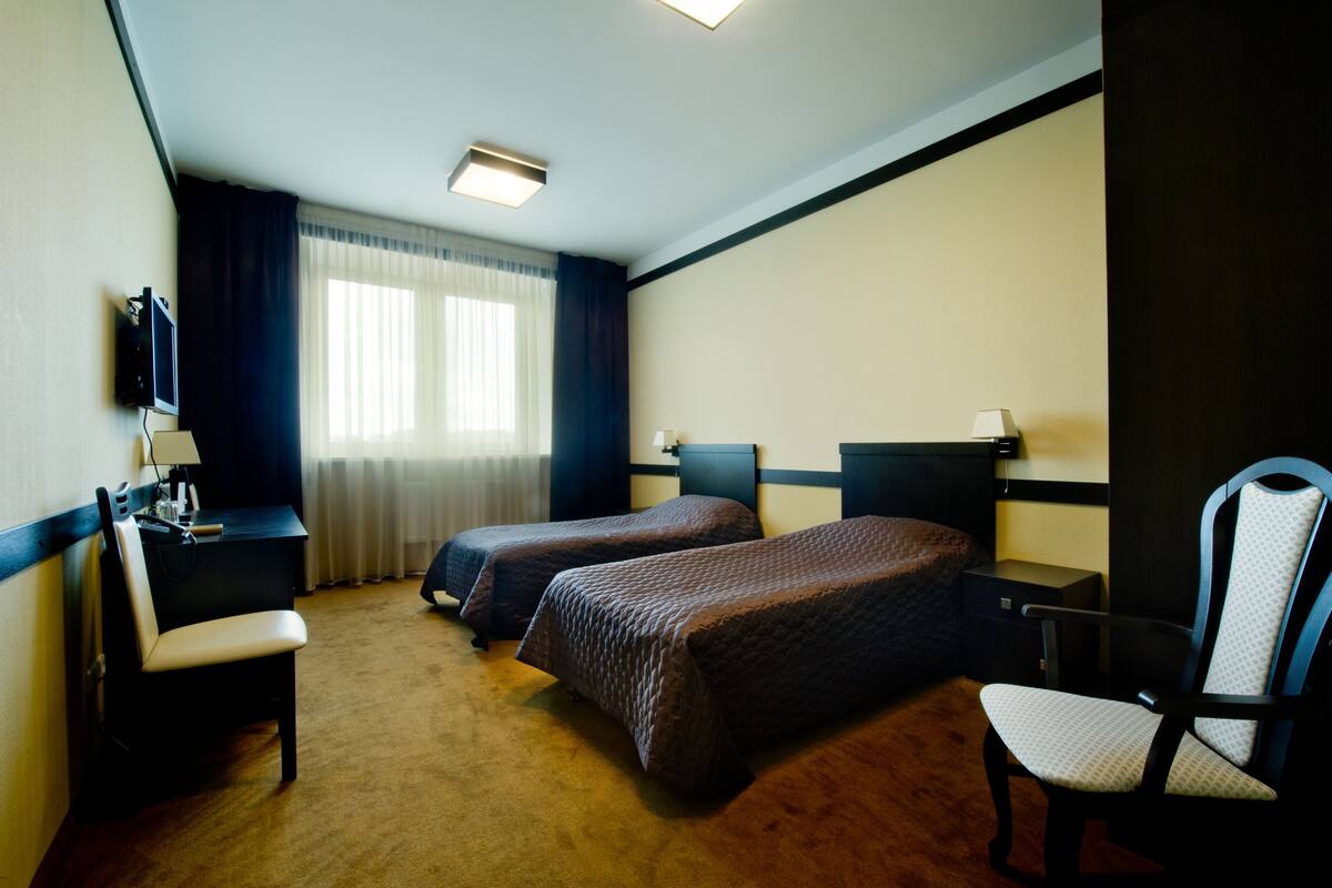 standard twin room | in-room safe, desk, soundproofing, free cots/infant beds