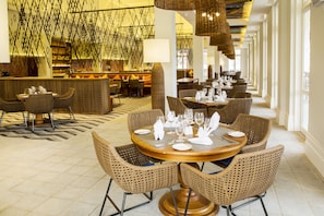 Breakfast, lunch, dinner served; international cuisine