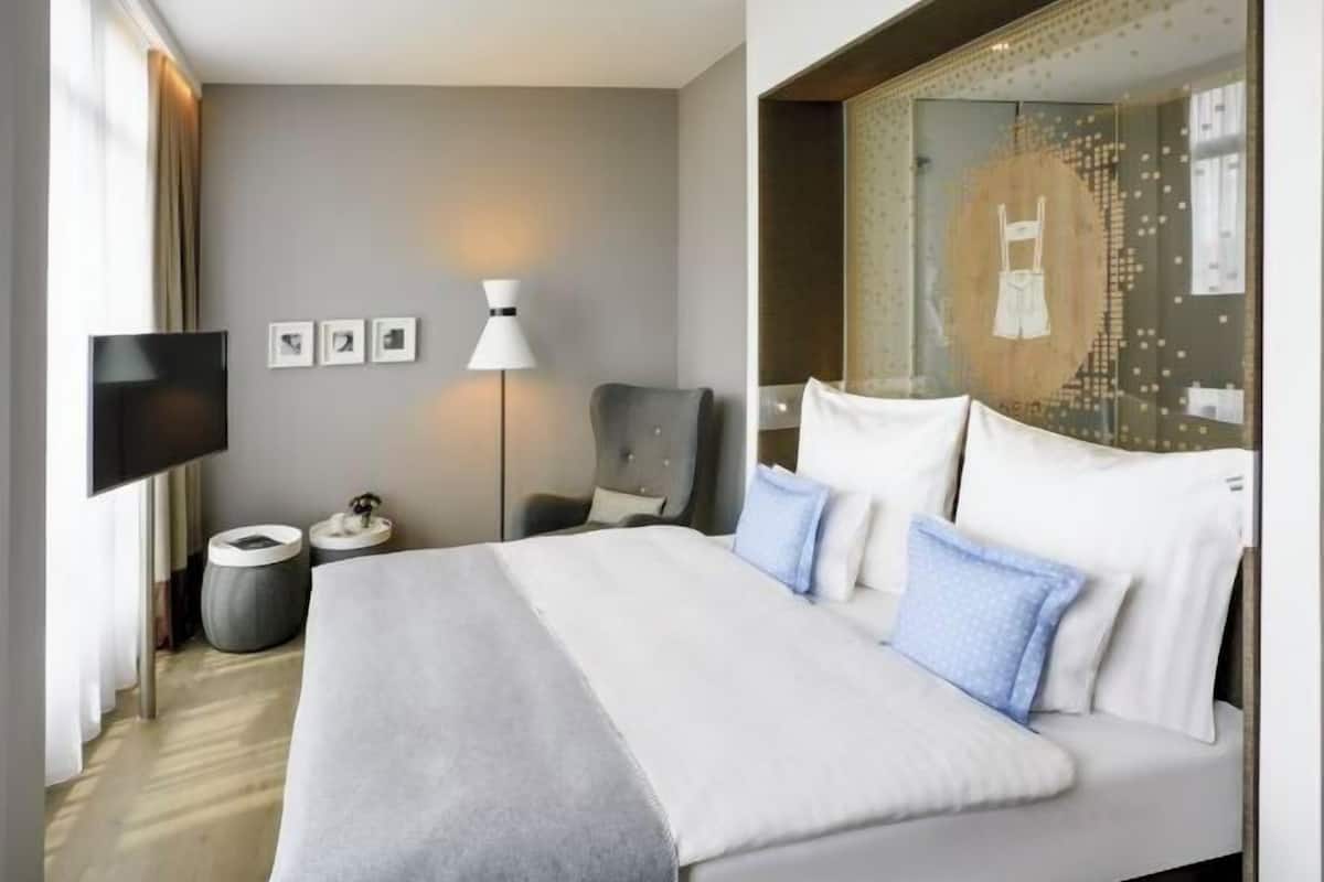 Premium bedding, down comforters, in-room safe, desk