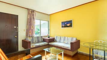 32-inch flat-screen TV with satellite channels, TV