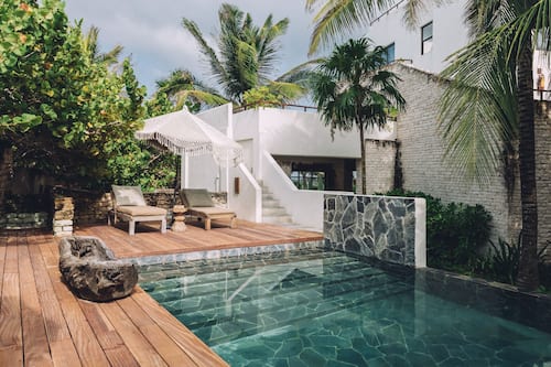 Outdoor pool, open 9:00 AM to 9:00 PM, pool umbrellas