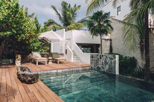 Outdoor pool, open 9:00 AM to 9:00 PM, pool umbrellas