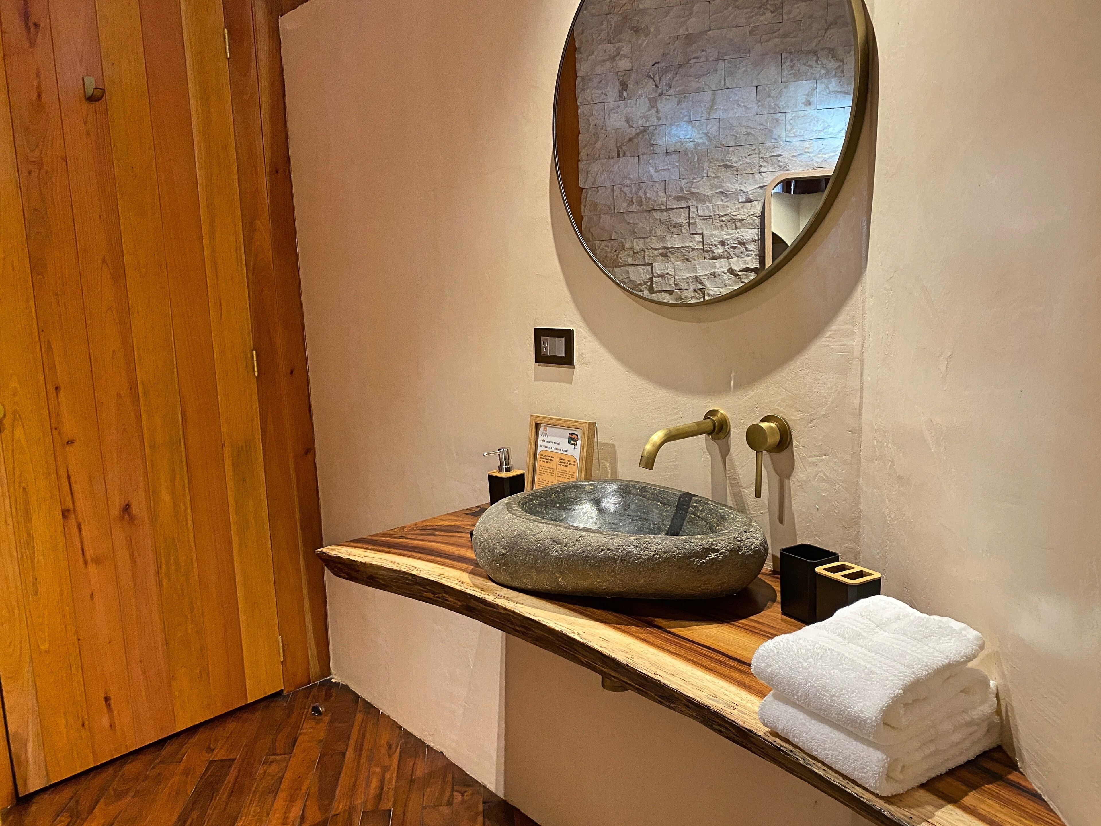 deluxe cabin | bathroom | shower, free toiletries, hair dryer, towels