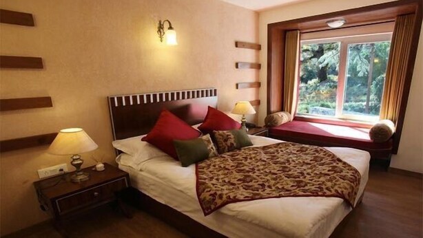 Quarto casal luxo, 1 cama Queen, para fumantes | Vista do quarto