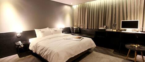 Premium bedding, down duvets, pillow-top beds, individually decorated