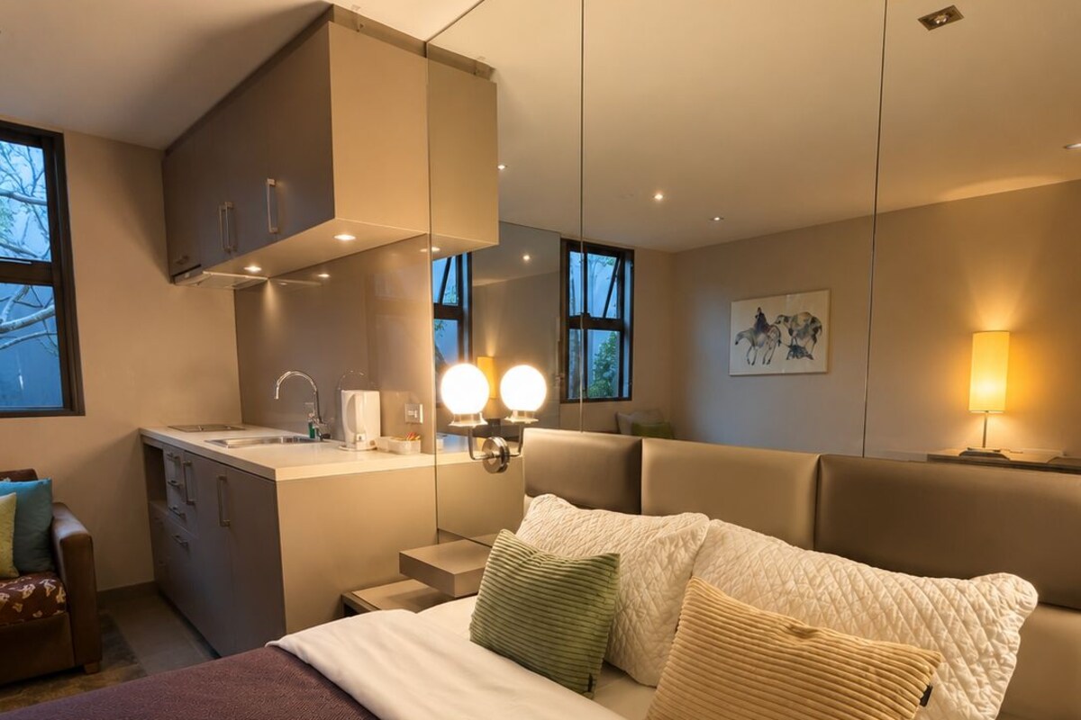 Pillowtop beds, desk, laptop workspace, soundproofing