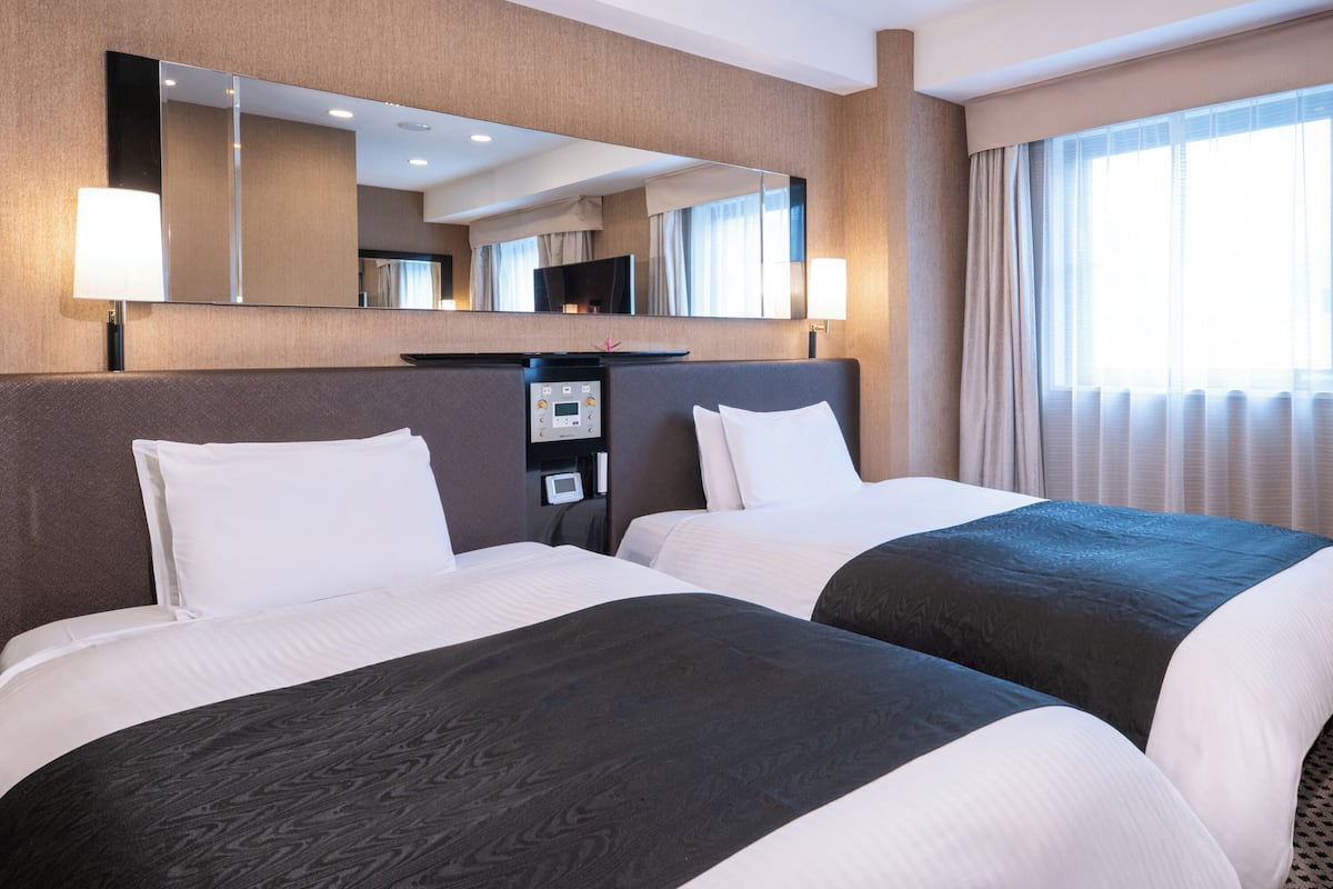 Habitación Deluxe con 2 camas individuales, para no fumadores | Ropa de cama de alta calidad, edredón y escritorio