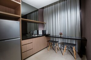 Full-size fridge - Upscale Suites (Jakarta)