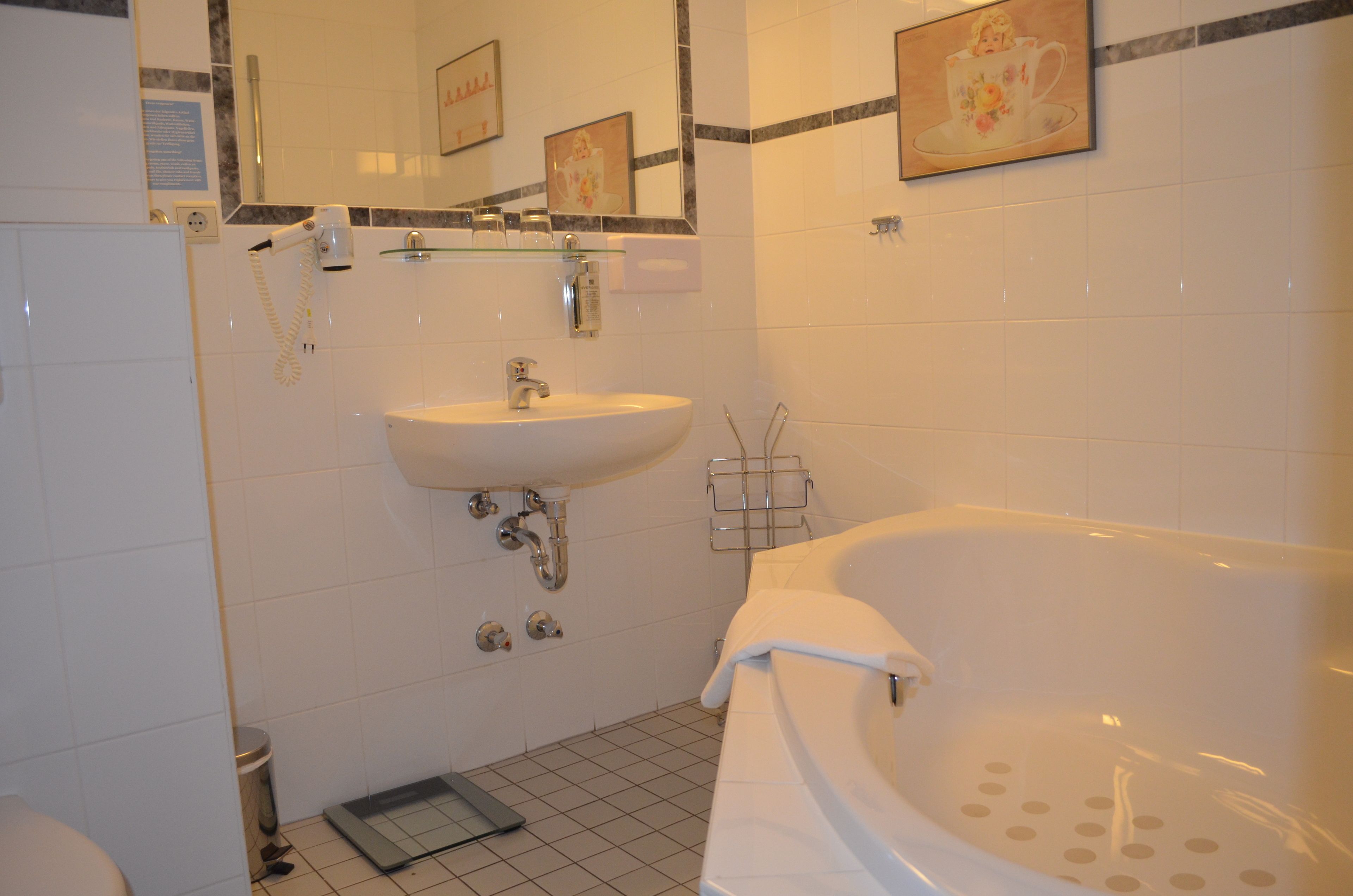 superior double room | bathroom | shower, free toiletries, hair dryer, towels